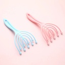 مشط الاخطبوط لتدليك فروة الراس والمساعدة علي الاسترخاء