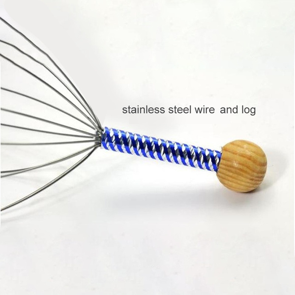 اداه مساج فروة الرأس اليدوية