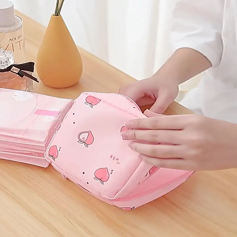 شنطة ميني لحمل وتخزين الفوط الصحية وتربروف للحفاظ علي المحتويات بسوستة سهلة الفتح والغلق لشنط الخروج والسفر