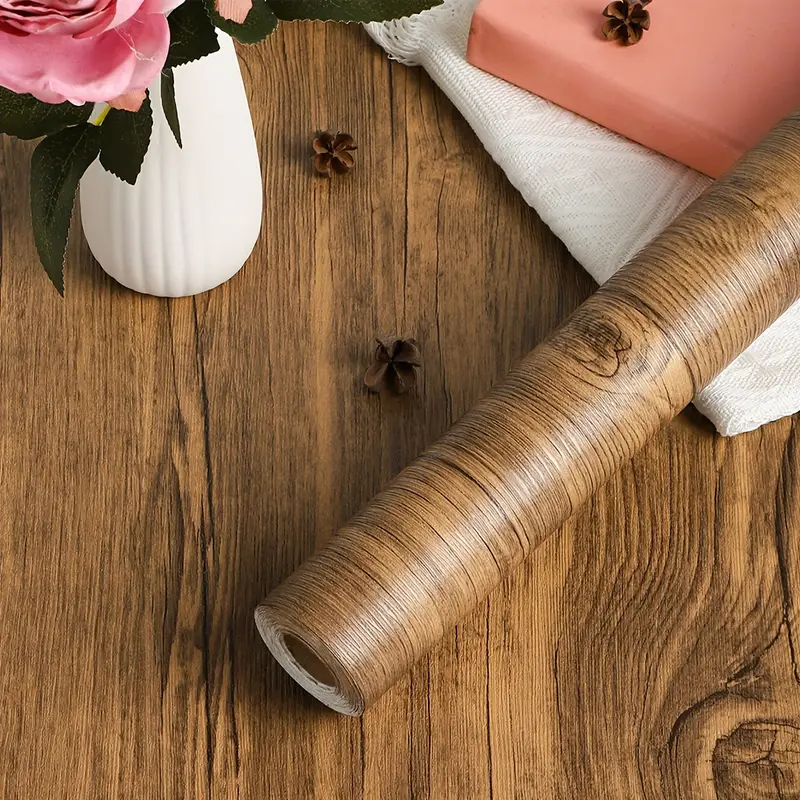 رول استيكر لاصق شكل خشبي باللون البني  لتجديد ديكور الحوائط والاثاث