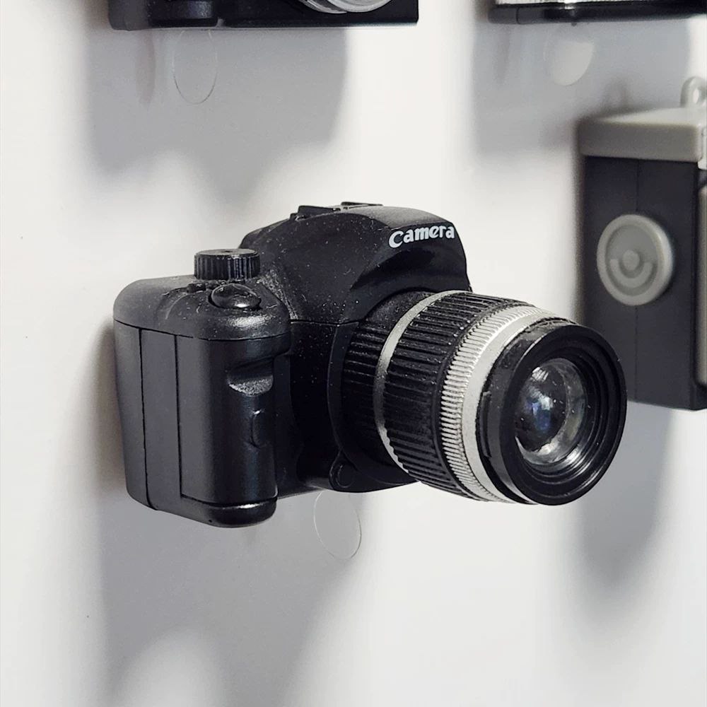 ميدالية على شكل كاميرا ميني تصدر صوت وفلاش للمفاتيح