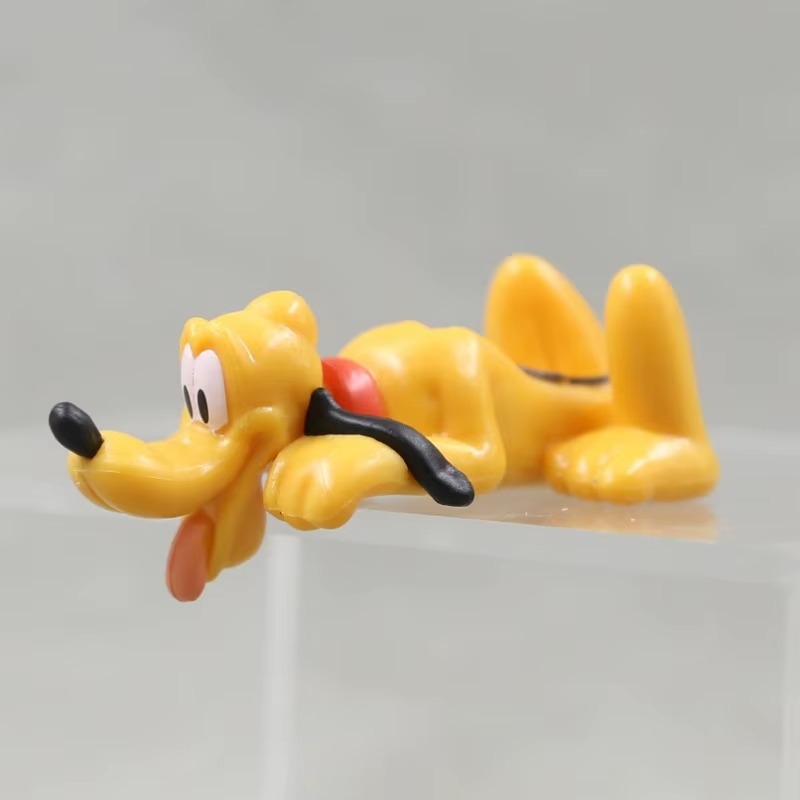 إكسسوار بتصميم بلوتو لتزين تابلوه السيارة