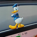 إكسسوار بتصميم بطوط لتزين تابلوه السيارة