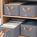 منظم ملابس للدواليب والادراج بيد قابل للطي