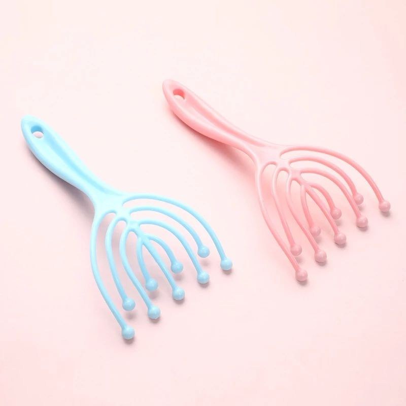 مشط الاخطبوط لتدليك فروة الراس والمساعدة علي الاسترخاء