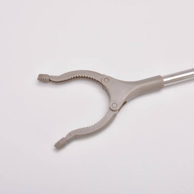 ملقاط وماسك لالتقاط من علي الارض بدون انحناء