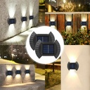 كشاف ليد حائطي يعمل بالطاقه الشمسية ويضئ تلقائيآ في الليل 4 قطع وتربروف للعمل تحت الامطار