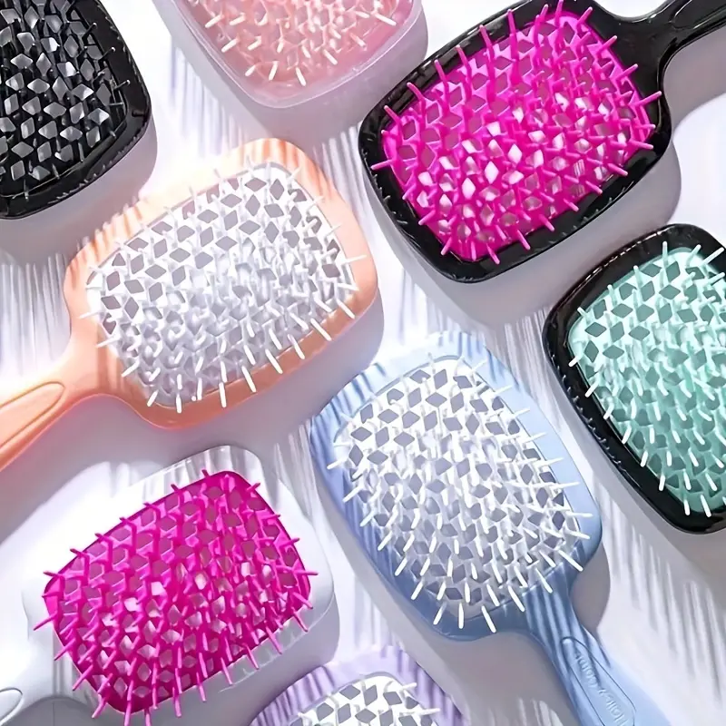 فرشة شعر مفرغة لتسريح وفك تشابك الشعر