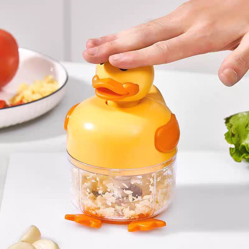 قطاعة ومفرمة يدوية للتوم والبصل والخضروات بشفرات ستاليس من الداخل  شكل بطة