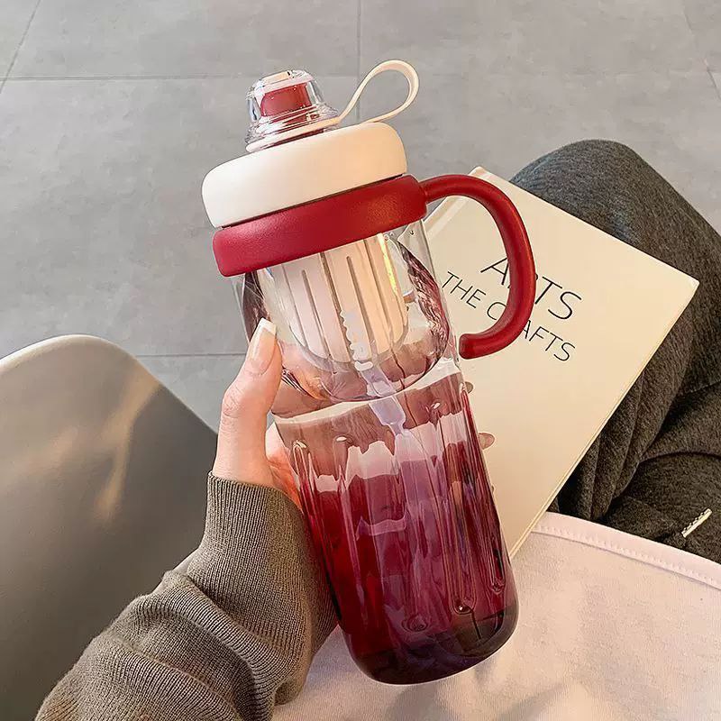 زجاجة مياه بلاستيكية بيد مريحة مناسبة للجيم بسعة 950 مل