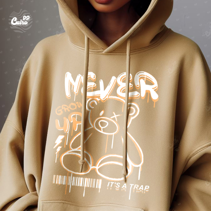 Never Grow Up هودي اوفر سايز قطن باللون البيج